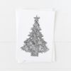 Hand drawn Christmas tree created from ornament doodles with a pointed flap envelope
