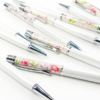 Floral Twist Pens from A Little Hello Co. Each pen contains a tiny art print.