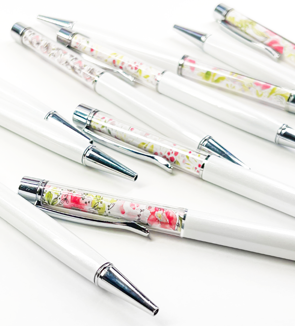 Floral Twist Pens from A Little Hello Co. Each pen contains a tiny art print.